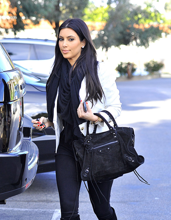 Kim And Kourtney Kardashian Visit And Check Up On Their Store Dash In Calabasas, CA